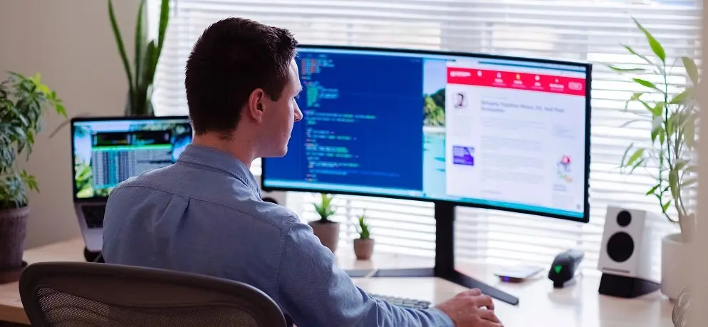 Man Working From Home Computeres Office