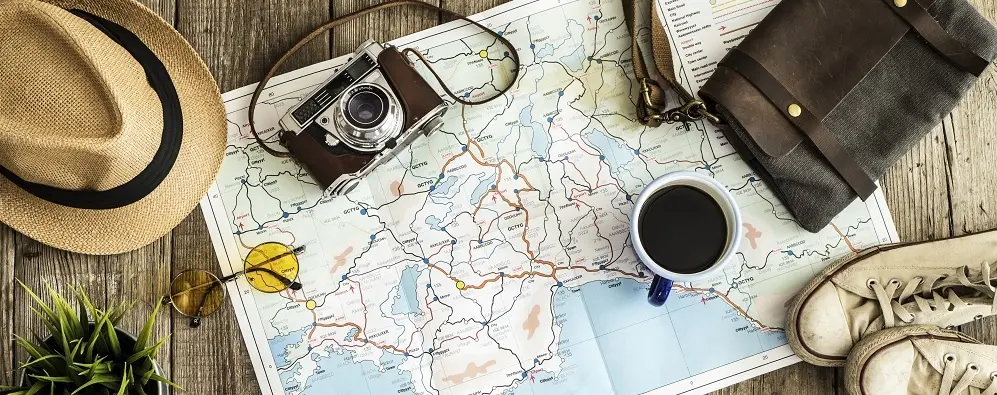 Travel Concept On Wooden Table