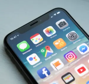 Cell phone screen displaying multiple travel apps