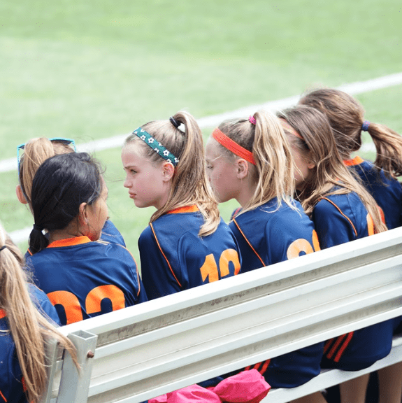 Girls Sports Team on the Bench