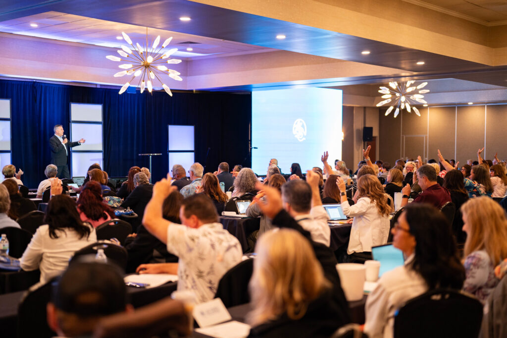 In-person attendees interacting in sessions