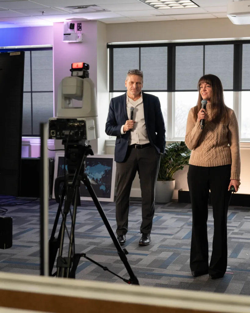 Geoff Cox and Lisa Leone reviewing the state of KHM Travel Group.