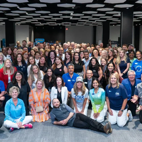 KHM Travel Group staff, suppliers, and agents posing for a picture at Destination Success